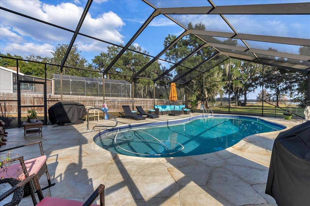 223 South Nesbitt Terrace Inverness, FL 34450 - Photo 47 of 85 a view of a swimming pool with a patio