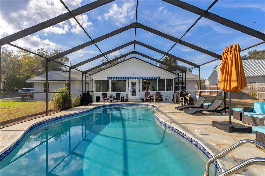 223 South Nesbitt Terrace Inverness, FL 34450 - Photo 49 of 85 a view of a swimming pool with sitting area