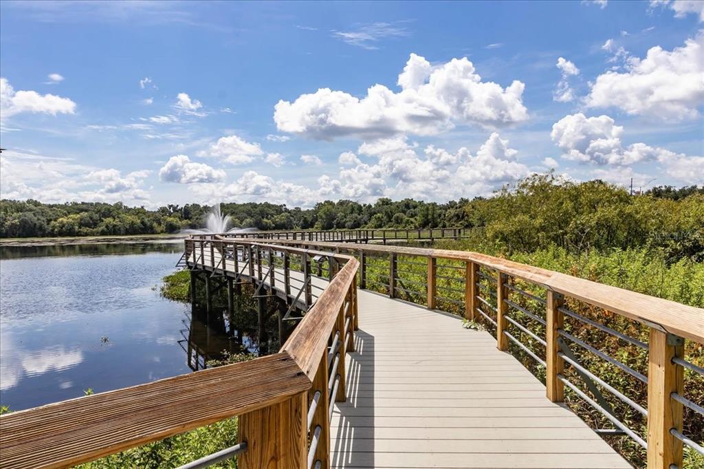 223 South Nesbitt Terrace Inverness, FL 34450 - Photo 73 of 85 a view of a balcony with wooden floor and lake view