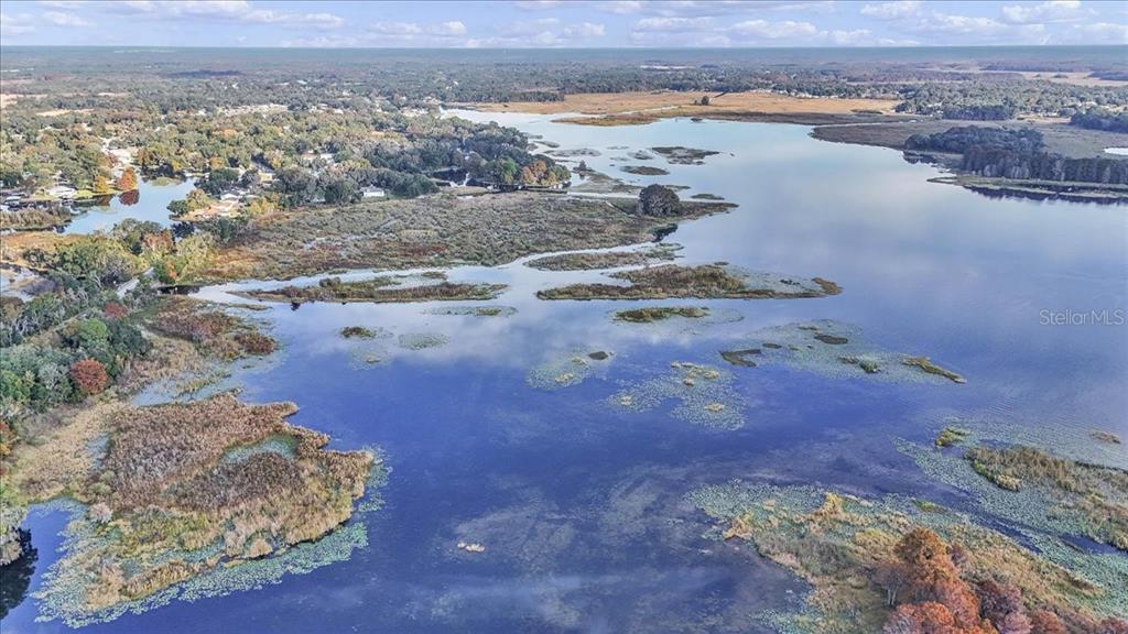 223 South Nesbitt Terrace Inverness, FL 34450 - Photo 10 of 85 a view of a lake with beach