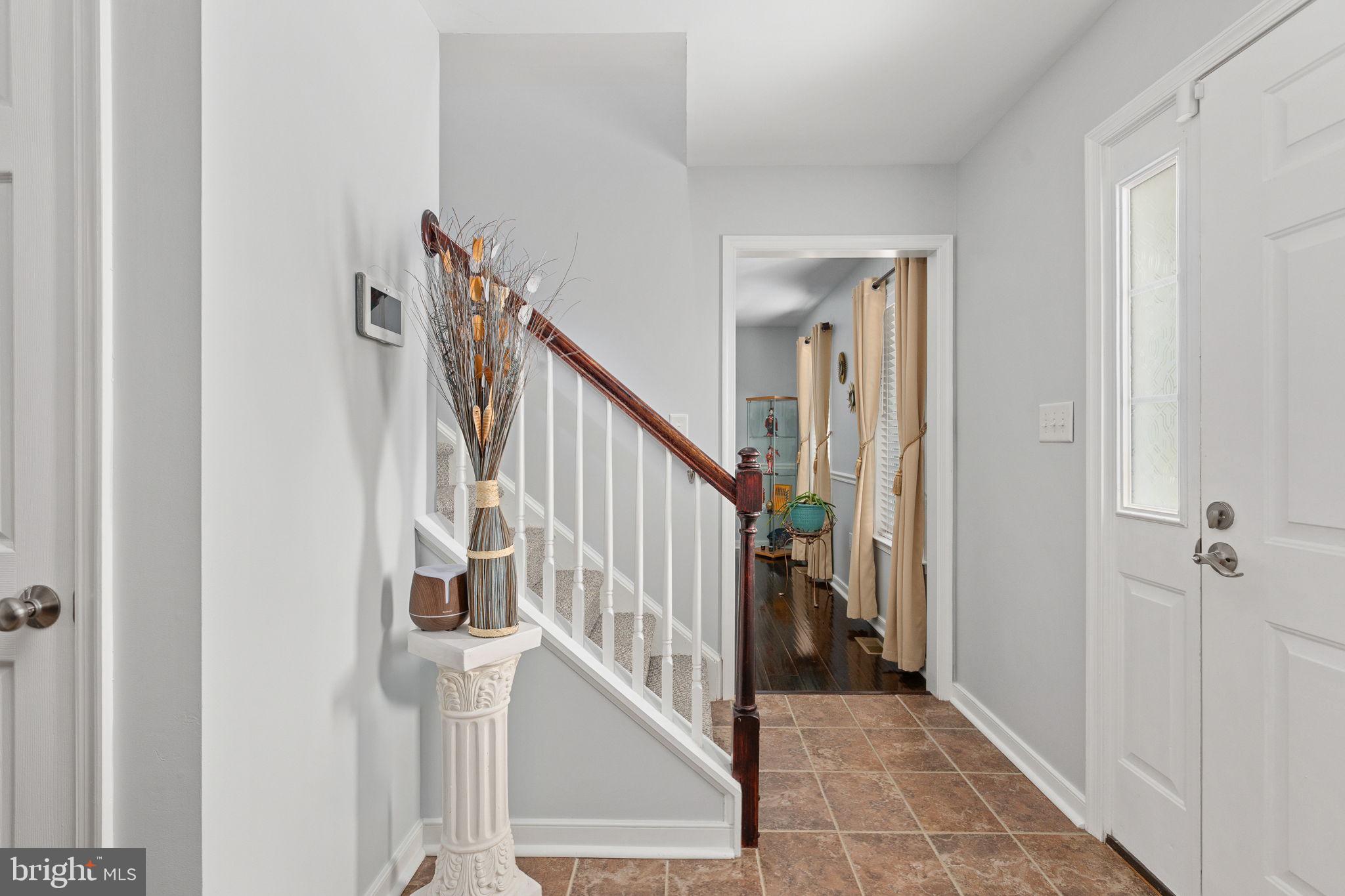 22088 Landora Bridge Road Ruther Glen, VA 22546 - Photo 23 of 122 Inviting entryway with elegant charm.