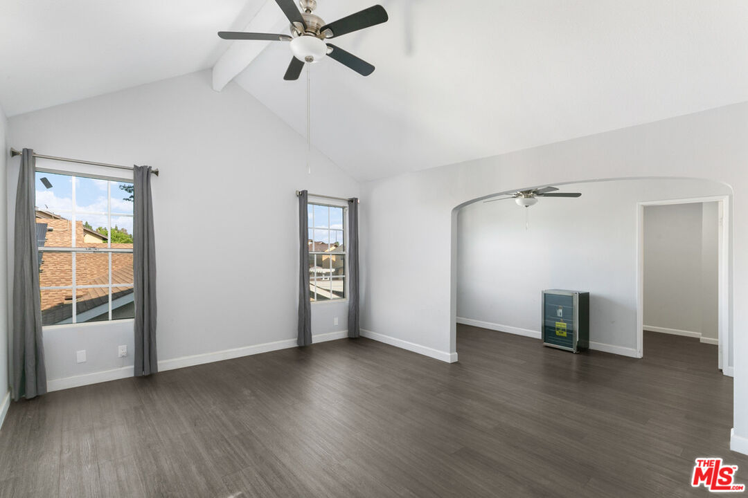 6703 Poinsettia Court Chino, CA 91710 - Photo 22 of 36 an empty room with wooden floor and windows