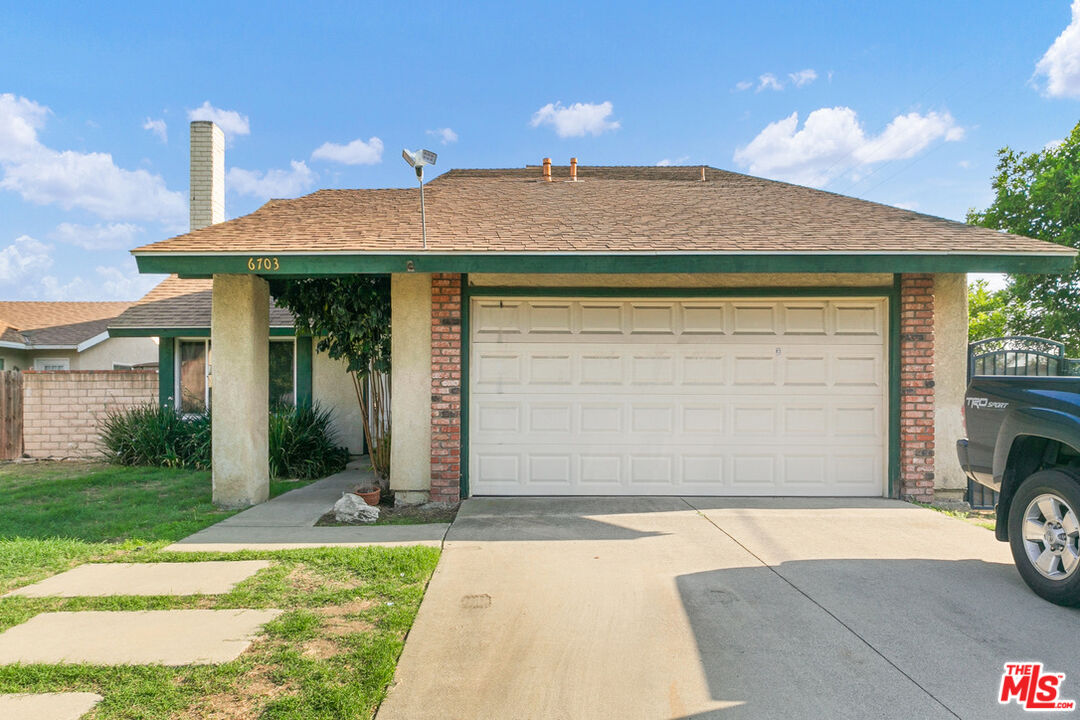 6703 Poinsettia Court Chino, CA 91710 - Photo 29 of 36 a front view of a house with a yard