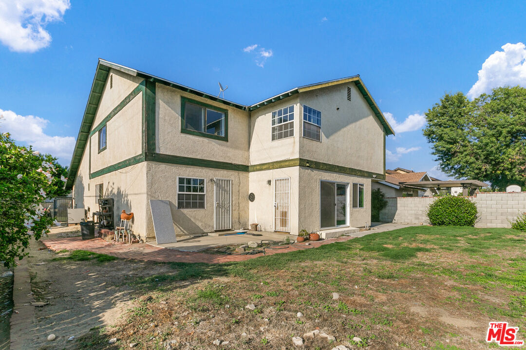 6703 Poinsettia Court Chino, CA 91710 - Photo 32 of 36 a front view of a house with garden