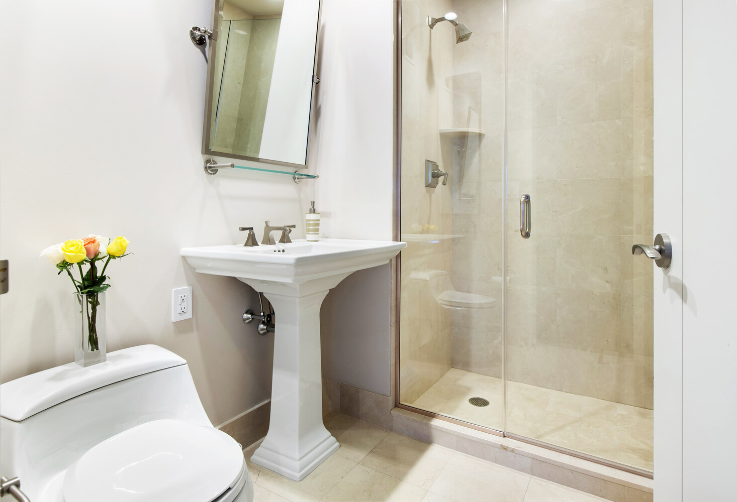 240 Riverside Boulevard, Unit 22BC Manhattan, NY 10069 - Photo 12 of 17 a bathroom with a sink toilet and shower