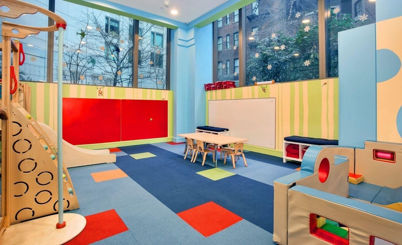 240 Riverside Boulevard, Unit 22BC Manhattan, NY 10069 - Photo 14 of 17 a room with toys and a table