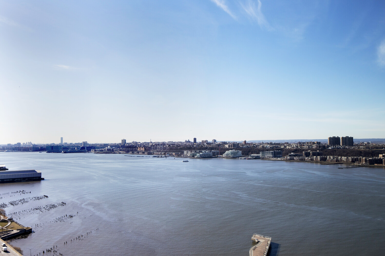 240 Riverside Boulevard, Unit 22BC Manhattan, NY 10069 - Photo 2 of 17 a view of a lake with houses