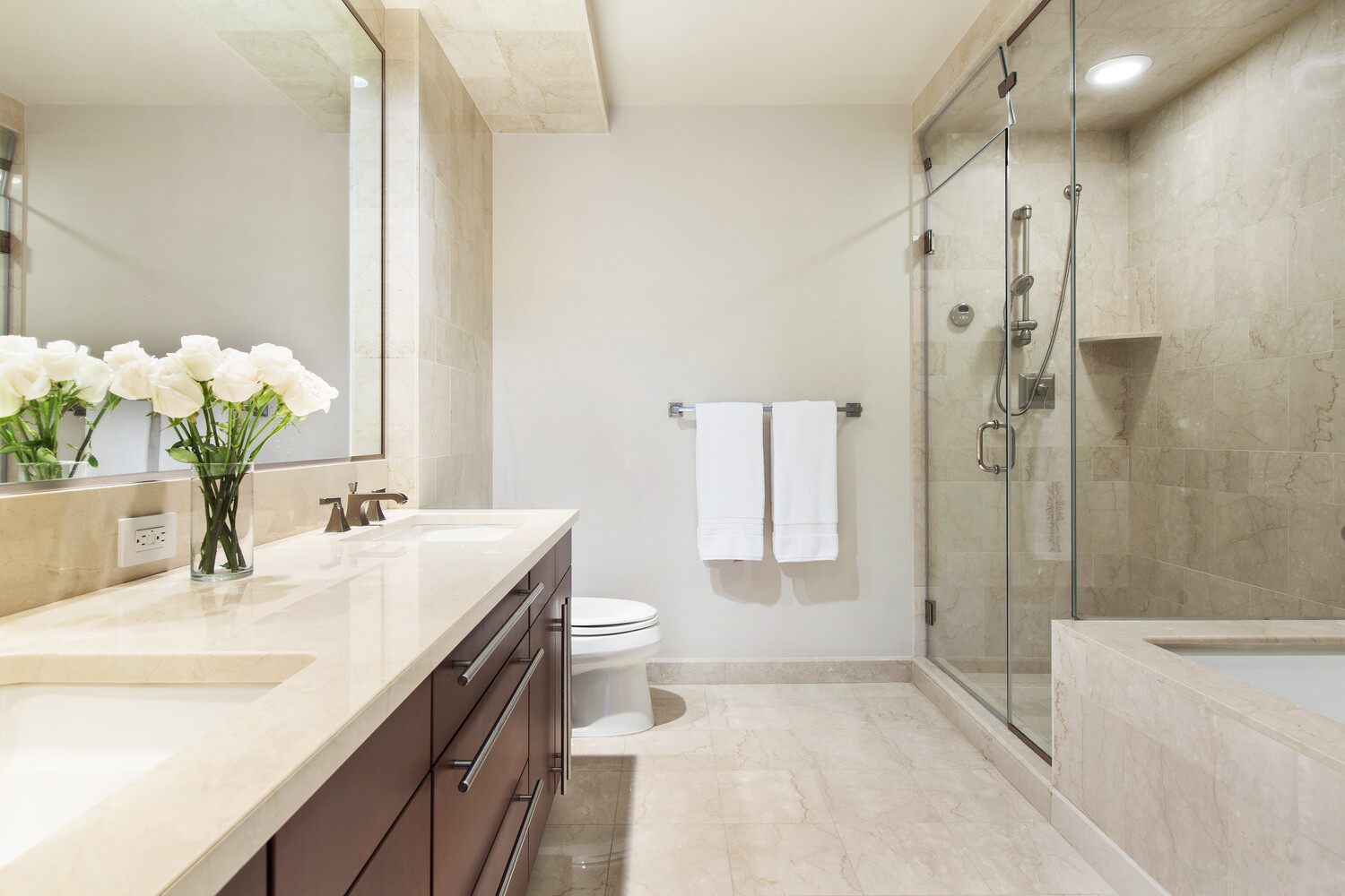 240 Riverside Boulevard, Unit 22BC Manhattan, NY 10069 - Photo 7 of 17 a bathroom with a granite countertop sink a toilet and shower