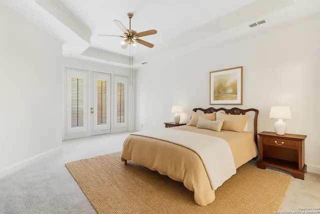 a spacious bathroom with a double vanity sink mirror and