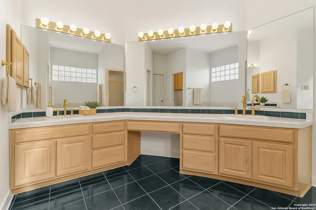 a bathroom with a bathtub and a sink