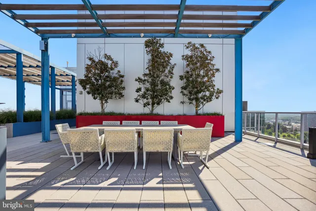 a view of a patio with swimming pool