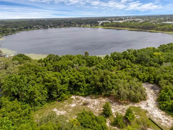 a view of a lake with mountain in the background