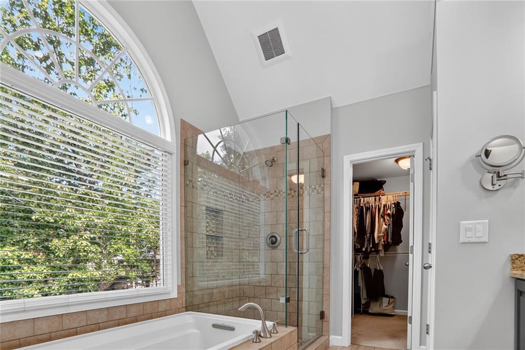 4760 Fontwell Court Suwanee, GA 30024 - Photo 19 of 43 a bathroom with a shower and a sink