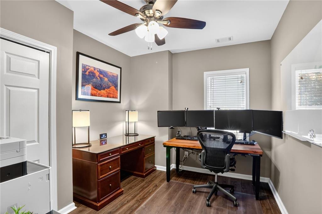 4760 Fontwell Court Suwanee, GA 30024 - Photo 32 of 43 a view of a workspace with furniture and a window