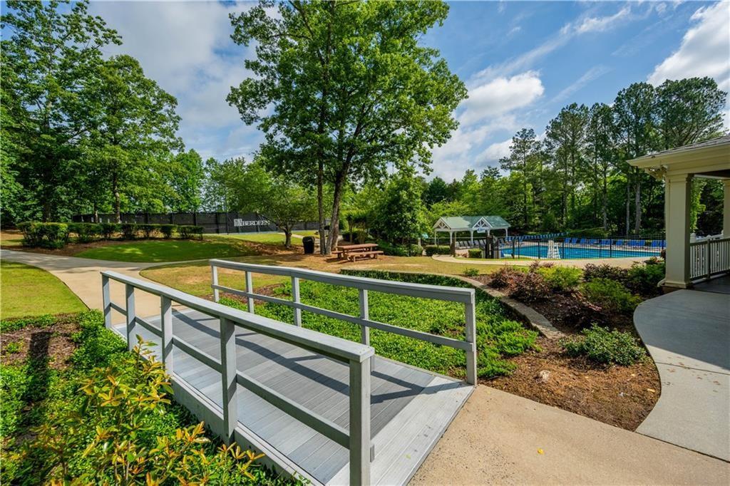 4760 Fontwell Court Suwanee, GA 30024 - Photo 38 of 43 a view of a swimming pool with a patio