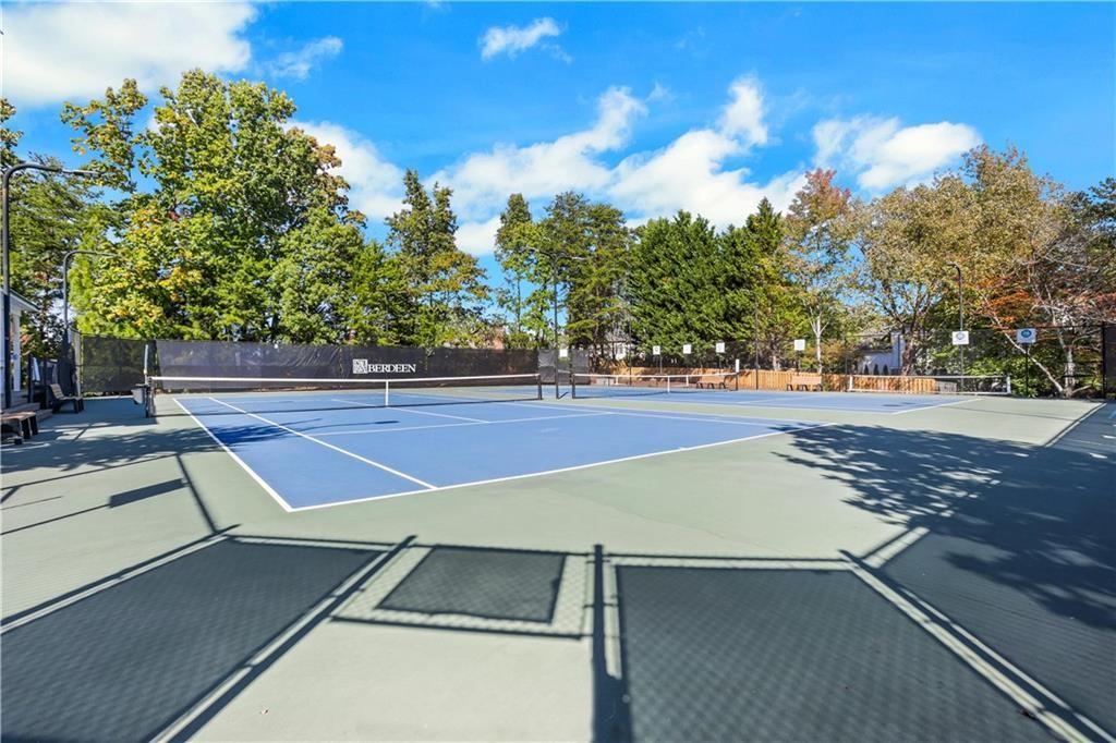 4760 Fontwell Court Suwanee, GA 30024 - Photo 42 of 43 a view of a tennis court