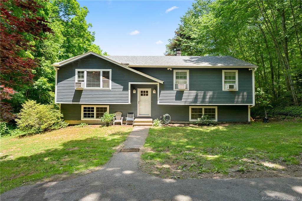 82 Pinebrook Road Colchester, CT 06415 - Photo 1 of 1 front view of a house with a yard