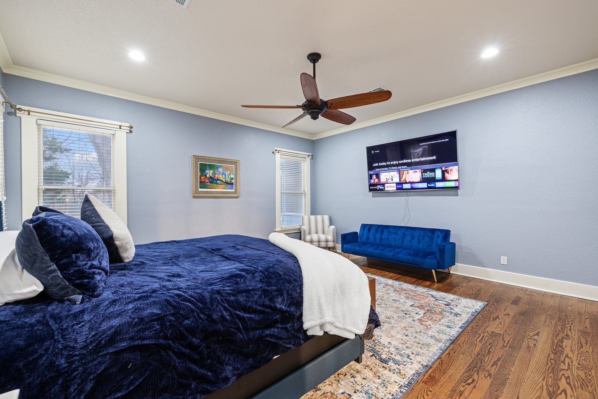 1211 Lexington Street Taylor, TX 76574 - Photo 15 of 40 a bedroom with a bed and a dresser next to a window