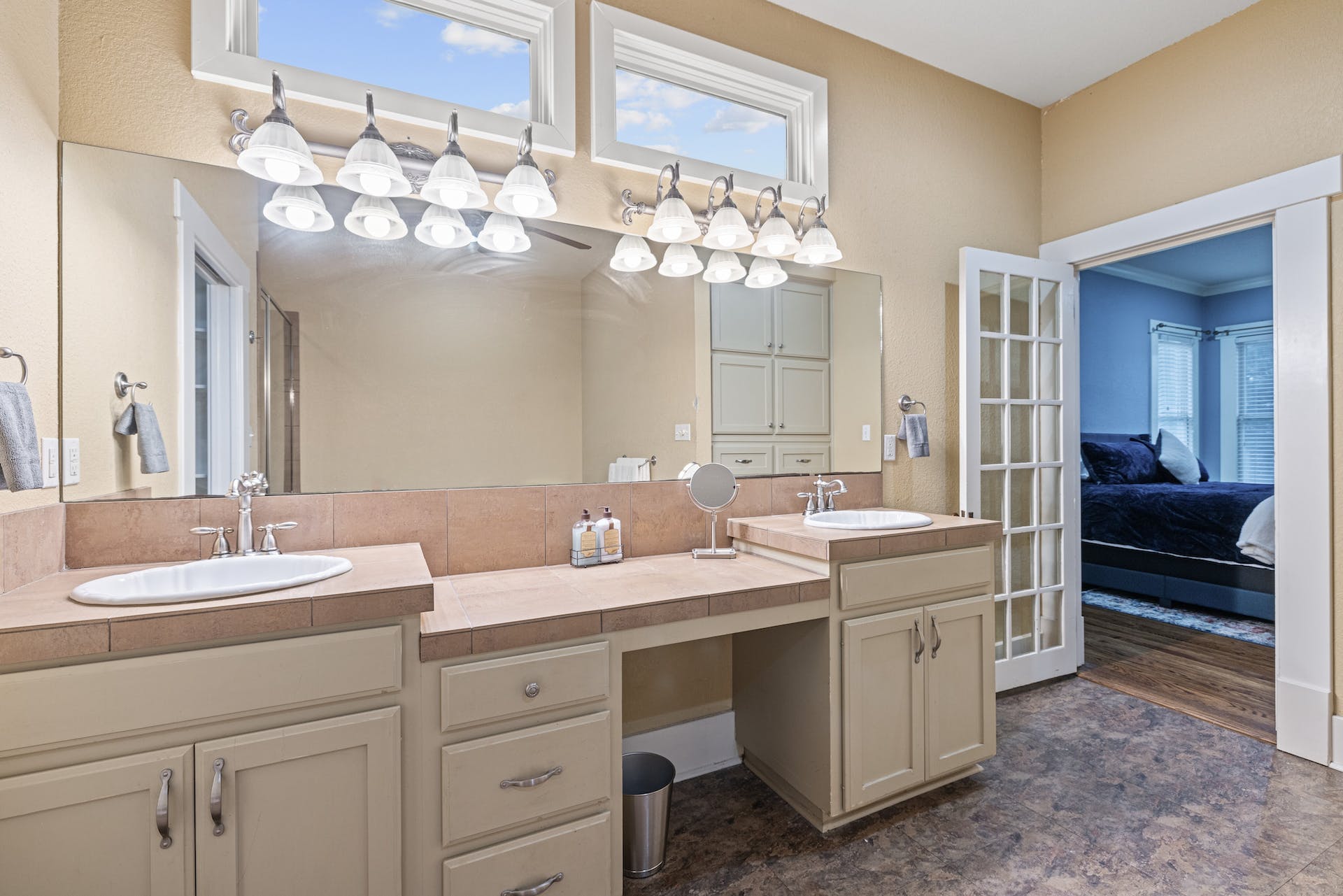 1211 Lexington Street Taylor, TX 76574 - Photo 18 of 40 a bathroom with a sink double vanity and a mirror