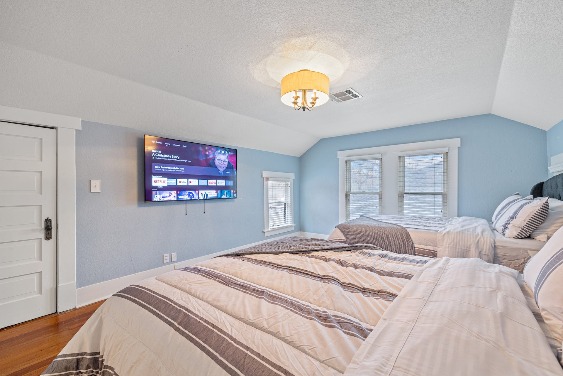 1211 Lexington Street Taylor, TX 76574 - Photo 26 of 40 a bedroom with a bed and a a white wall