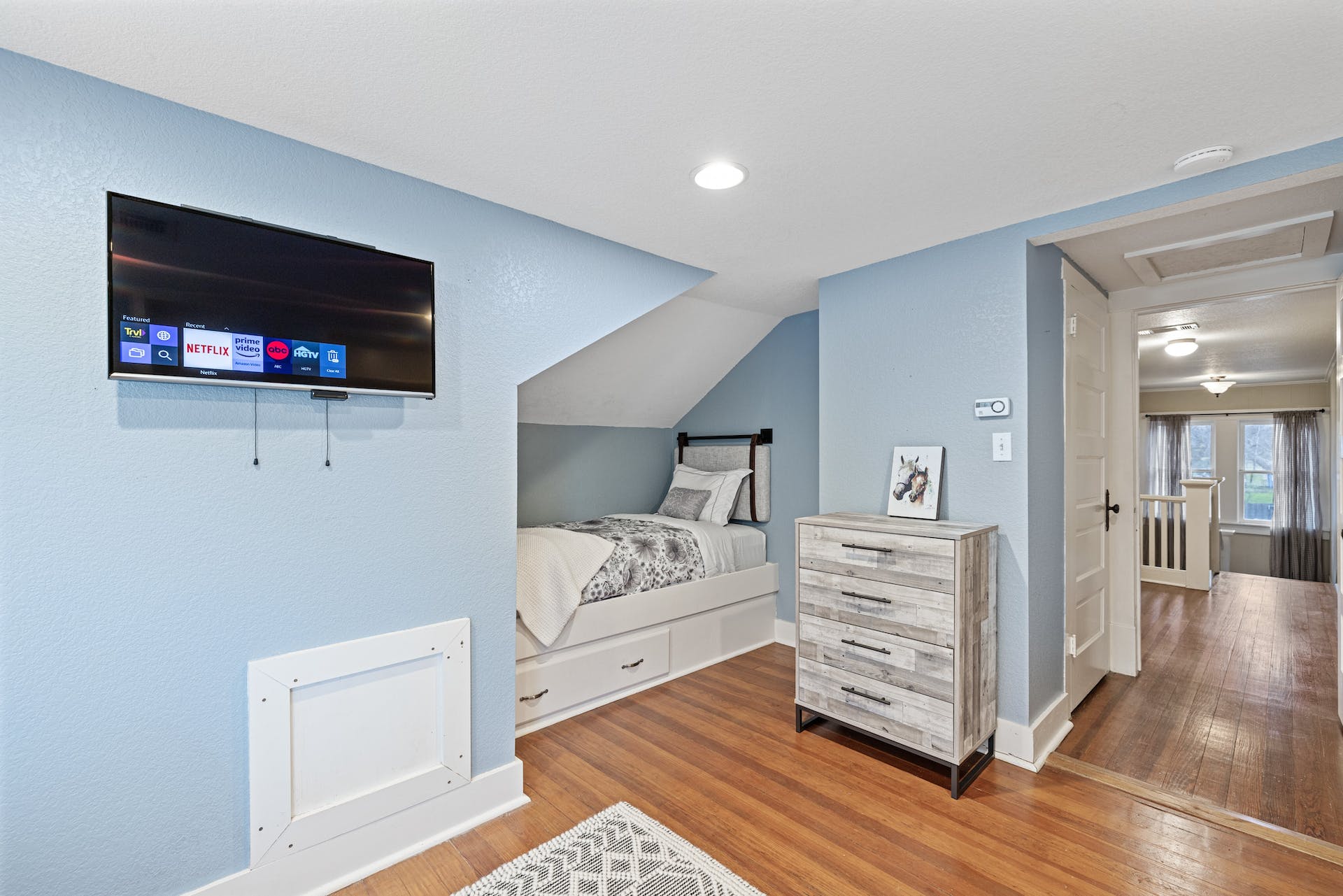 1211 Lexington Street Taylor, TX 76574 - Photo 28 of 40 a view of living room with furniture and flat screen tv