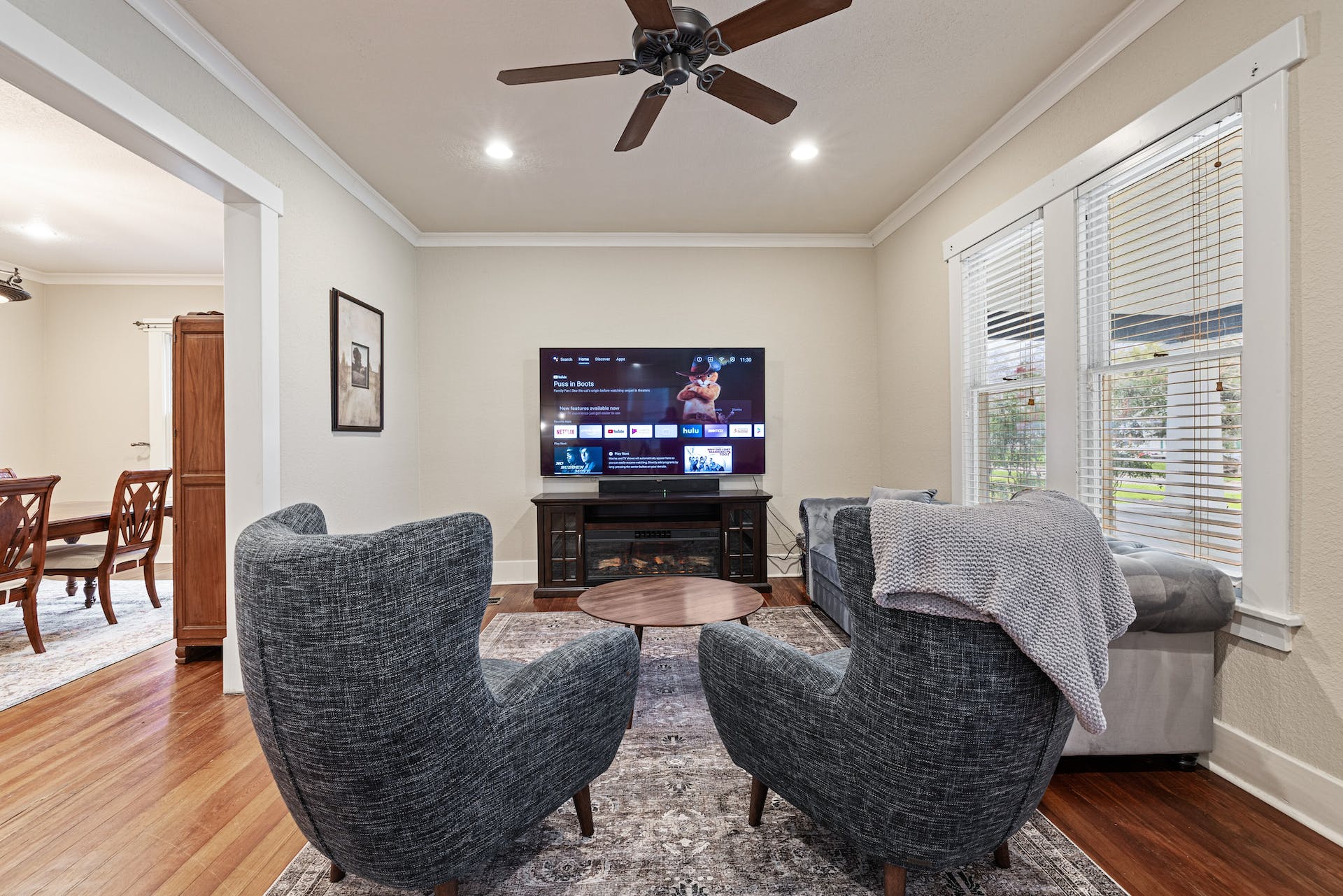 1211 Lexington Street Taylor, TX 76574 - Photo 3 of 40 a living room with furniture and a flat screen tv