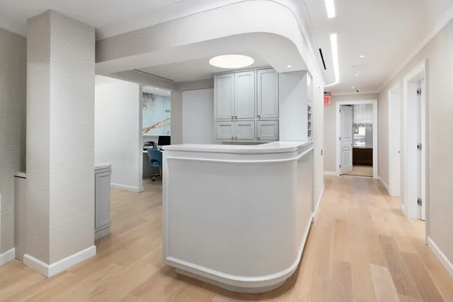 a view of a kitchen from the hallway