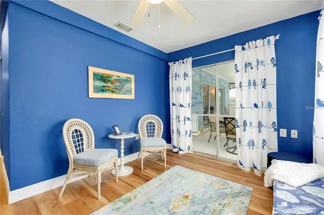 a view of a livingroom with furniture and a table