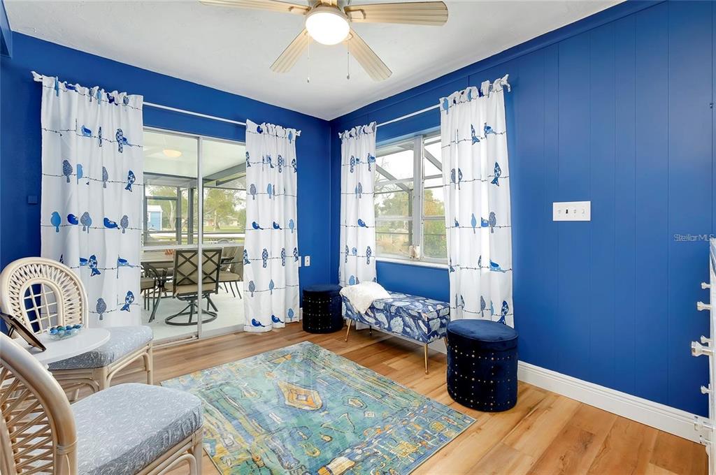 6560 Marius Road North Port, FL 34287 - Photo 15 of 35 a living room with furniture and wooden floor