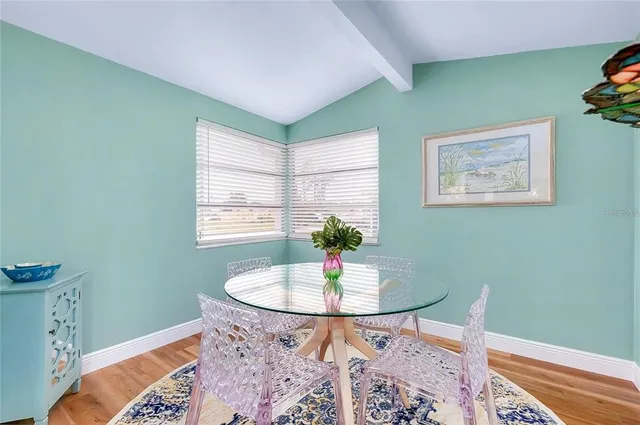 a workspace with furniture and window