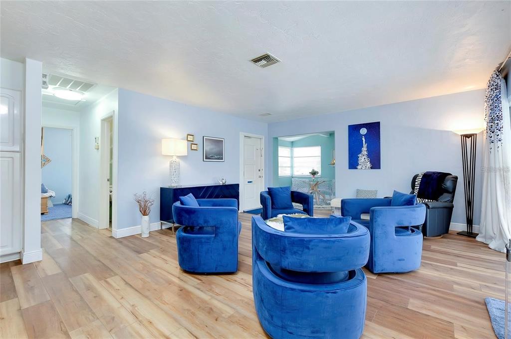 6560 Marius Road North Port, FL 34287 - Photo 25 of 35 a living room with furniture and wooden floor