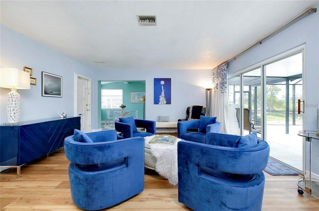 6560 Marius Road North Port, FL 34287 - Photo 26 of 35 a living room with furniture and a large window