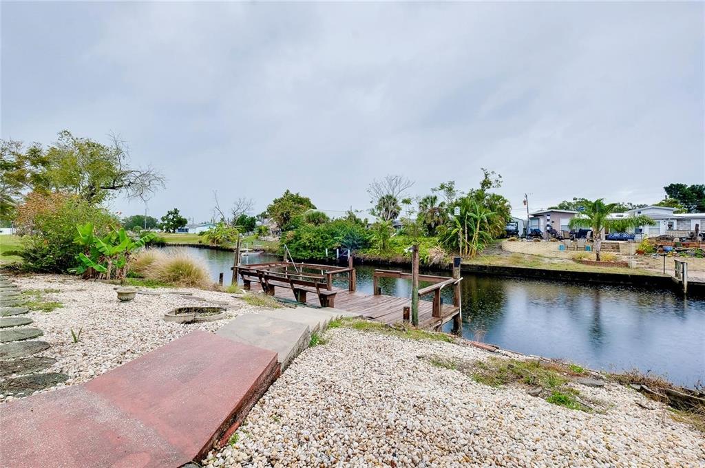 6560 Marius Road North Port, FL 34287 - Photo 34 of 35 a view of a lake with boats and trees in the background