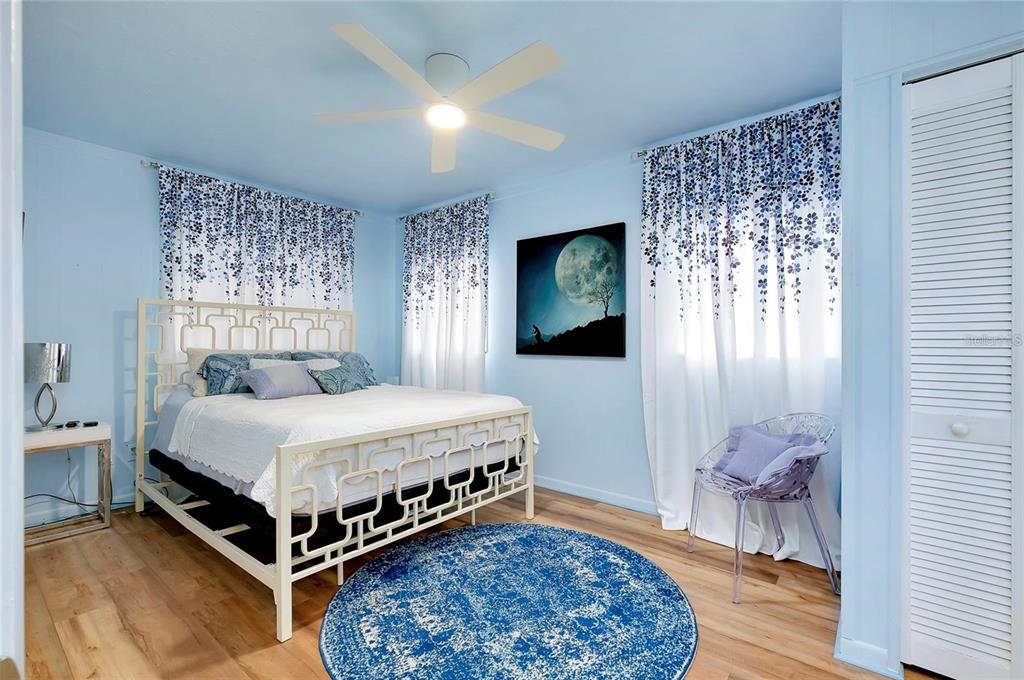 6560 Marius Road North Port, FL 34287 - Photo 4 of 35 a bedroom with a bed and a flat screen tv