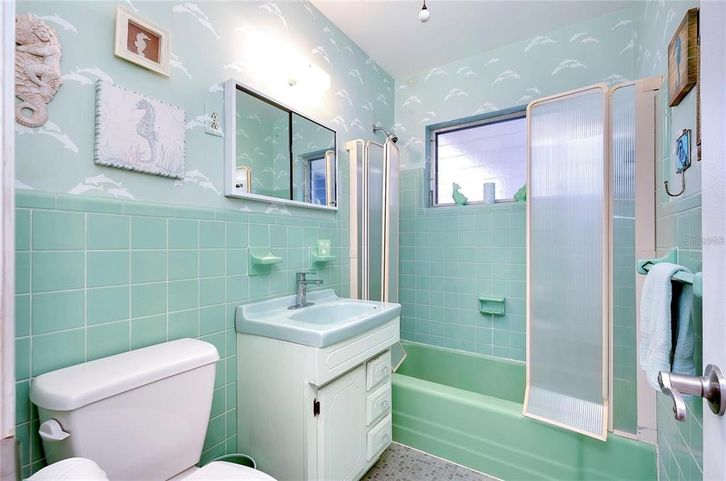 6560 Marius Road North Port, FL 34287 - Photo 8 of 35 a bathroom with a sink toilet and shower