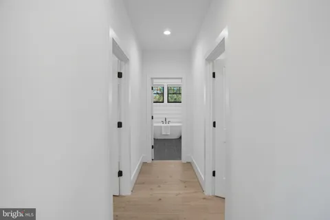 a view of a bedroom from the hallway
