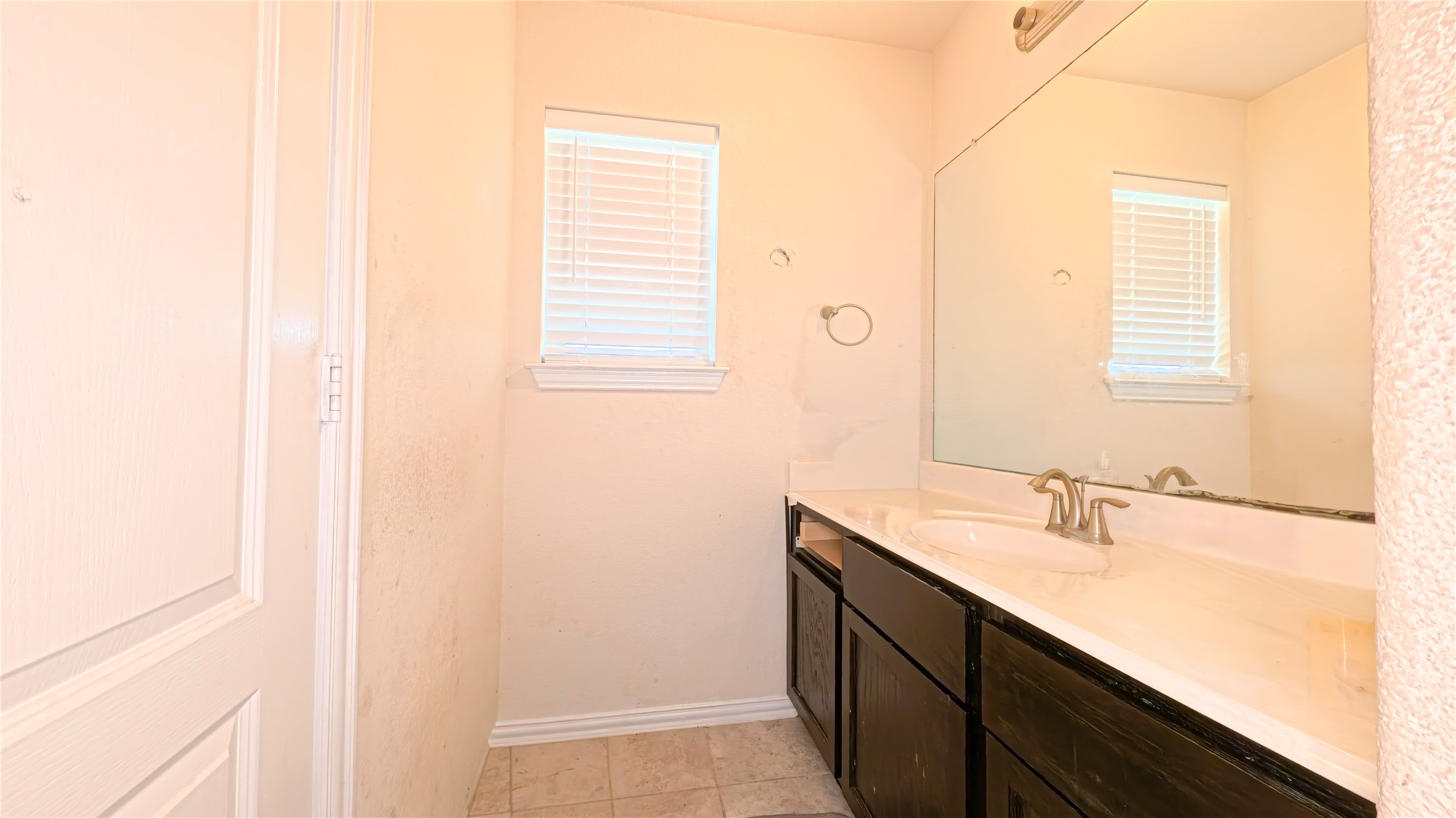 9707 Shimmering Lakes Drive Rosharon, TX 77583 - Photo 12 of 19 a bathroom with a sink a vanity and a mirror