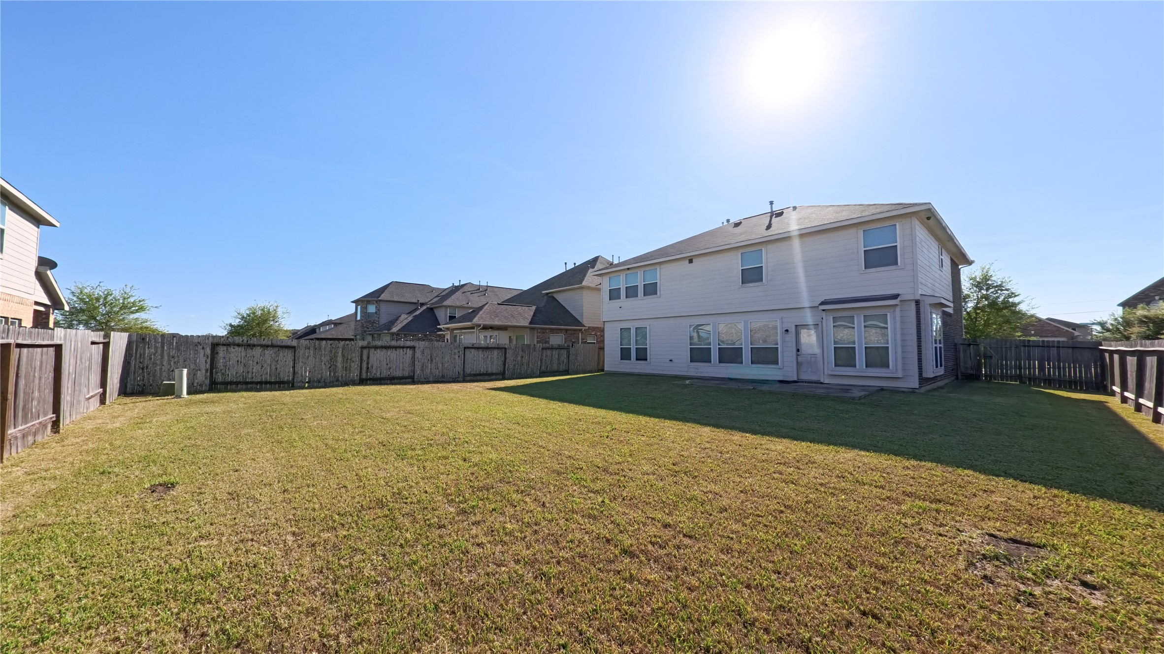 9707 Shimmering Lakes Drive Rosharon, TX 77583 - Photo 19 of 19 a view of a house with a yard