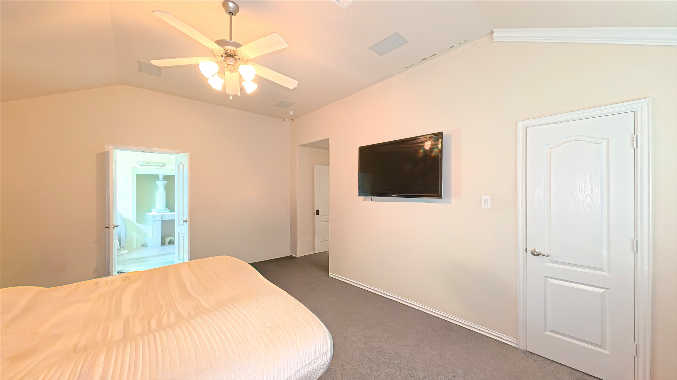 9707 Shimmering Lakes Drive Rosharon, TX 77583 - Photo 7 of 19 a bedroom with a bed and a flat screen tv