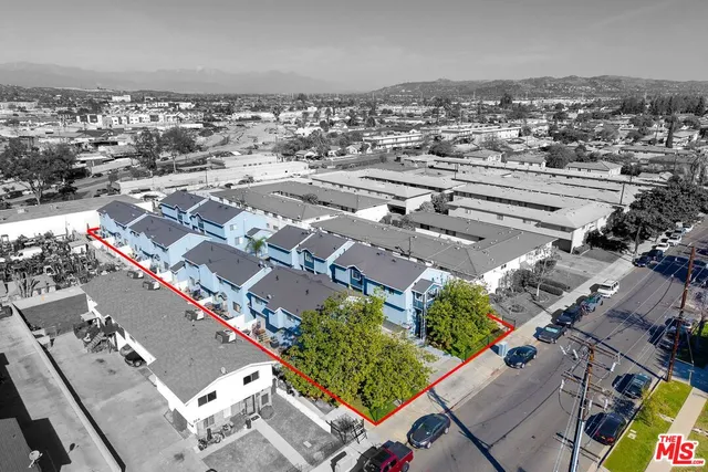 an aerial view of a city with lots of residential buildings