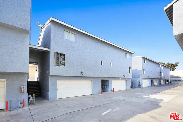a view of a house with a stove and kitchen