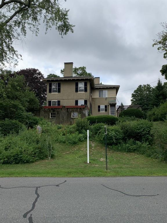 75 Pleasant Street Newton, MA 02459 - Photo 11 of 14 a house view with a garden space