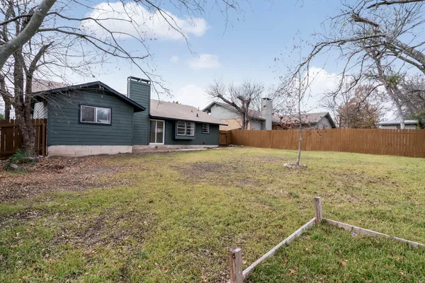 a house with trees in front of it