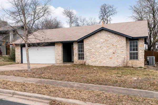 a house with yard in front of it