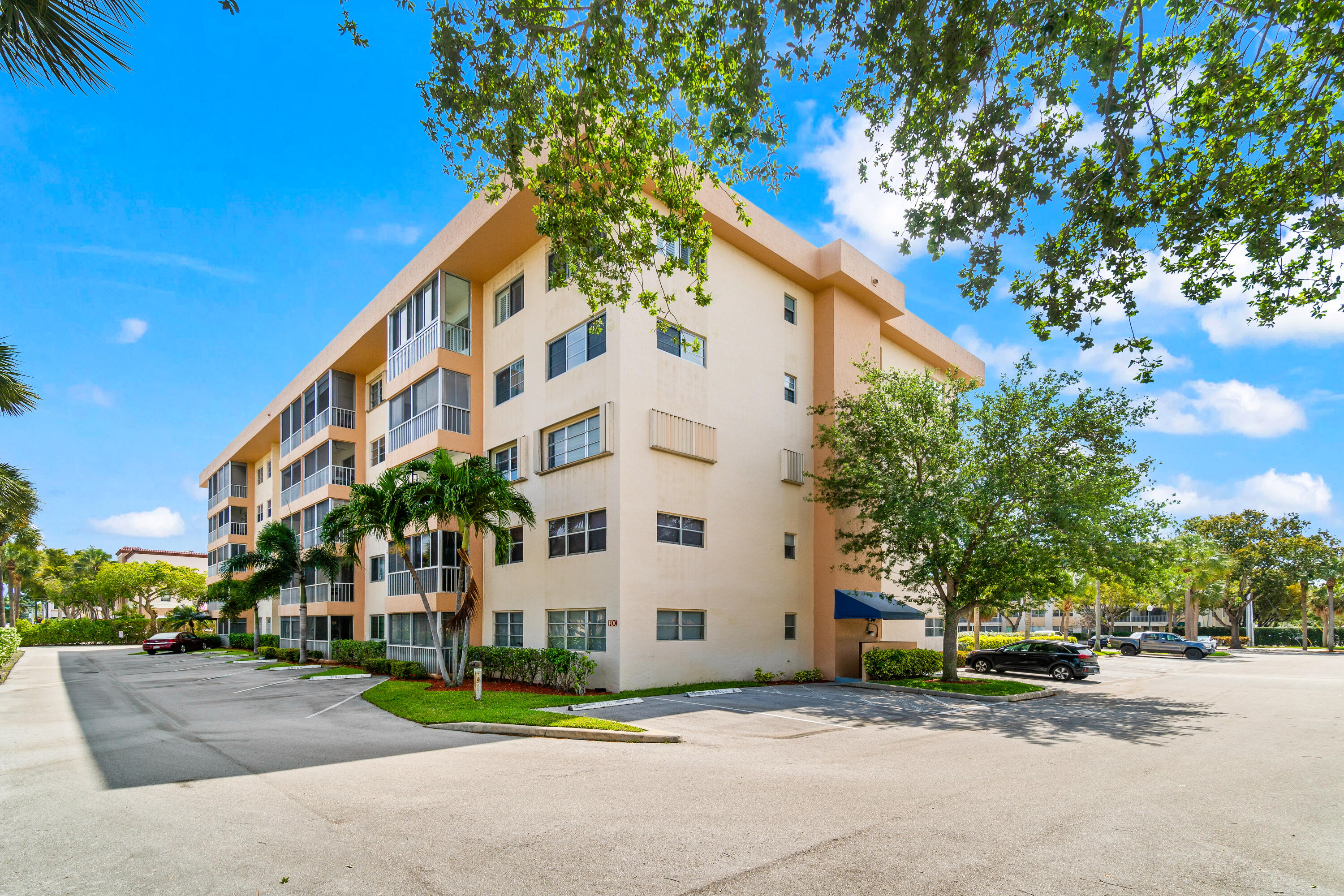 290 West Palmetto Park Road, Unit 114 Boca Raton, FL 33432 - Photo 25 of 25 a view of a building with a street