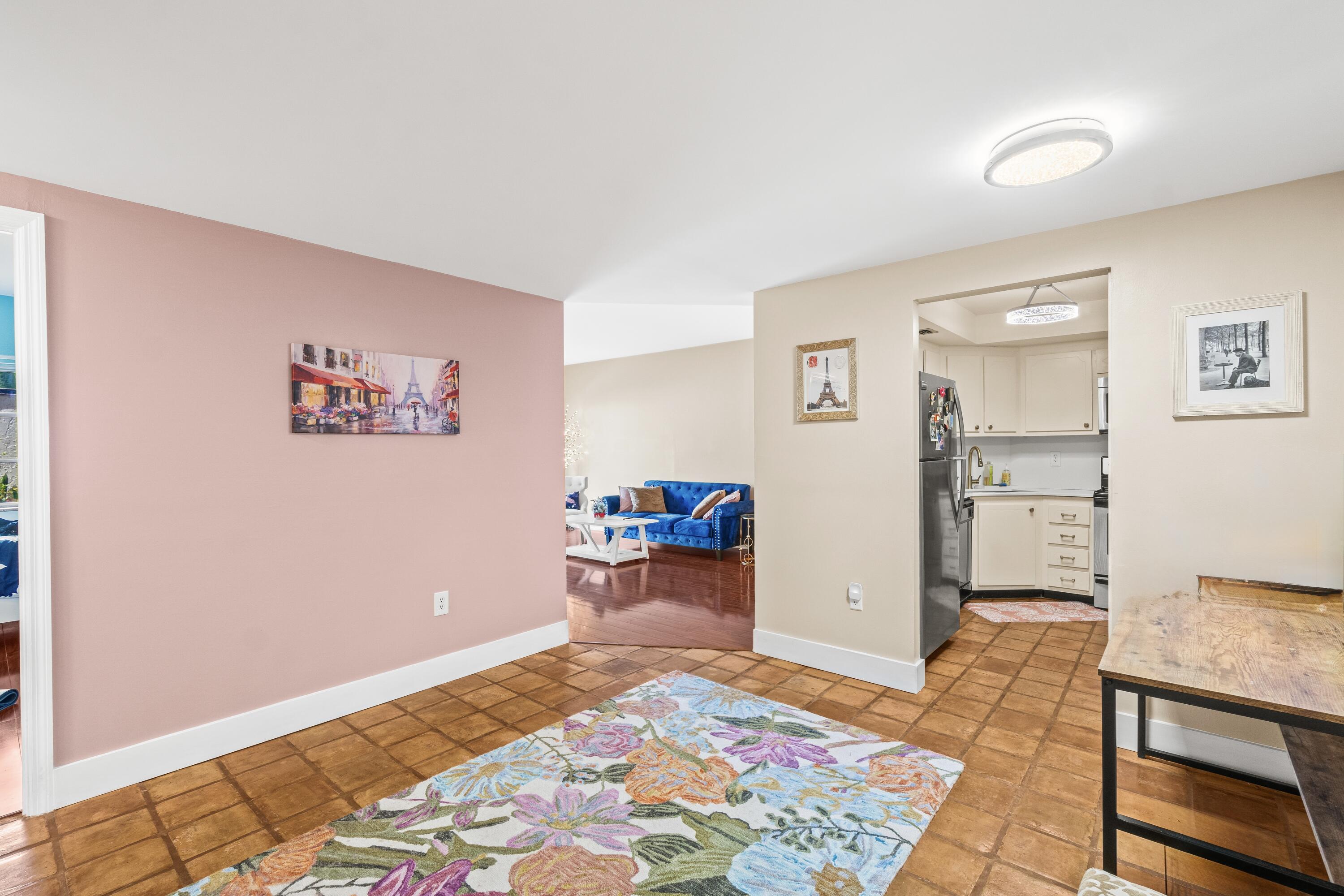 290 West Palmetto Park Road, Unit 114 Boca Raton, FL 33432 - Photo 4 of 25 a bed room with a bed