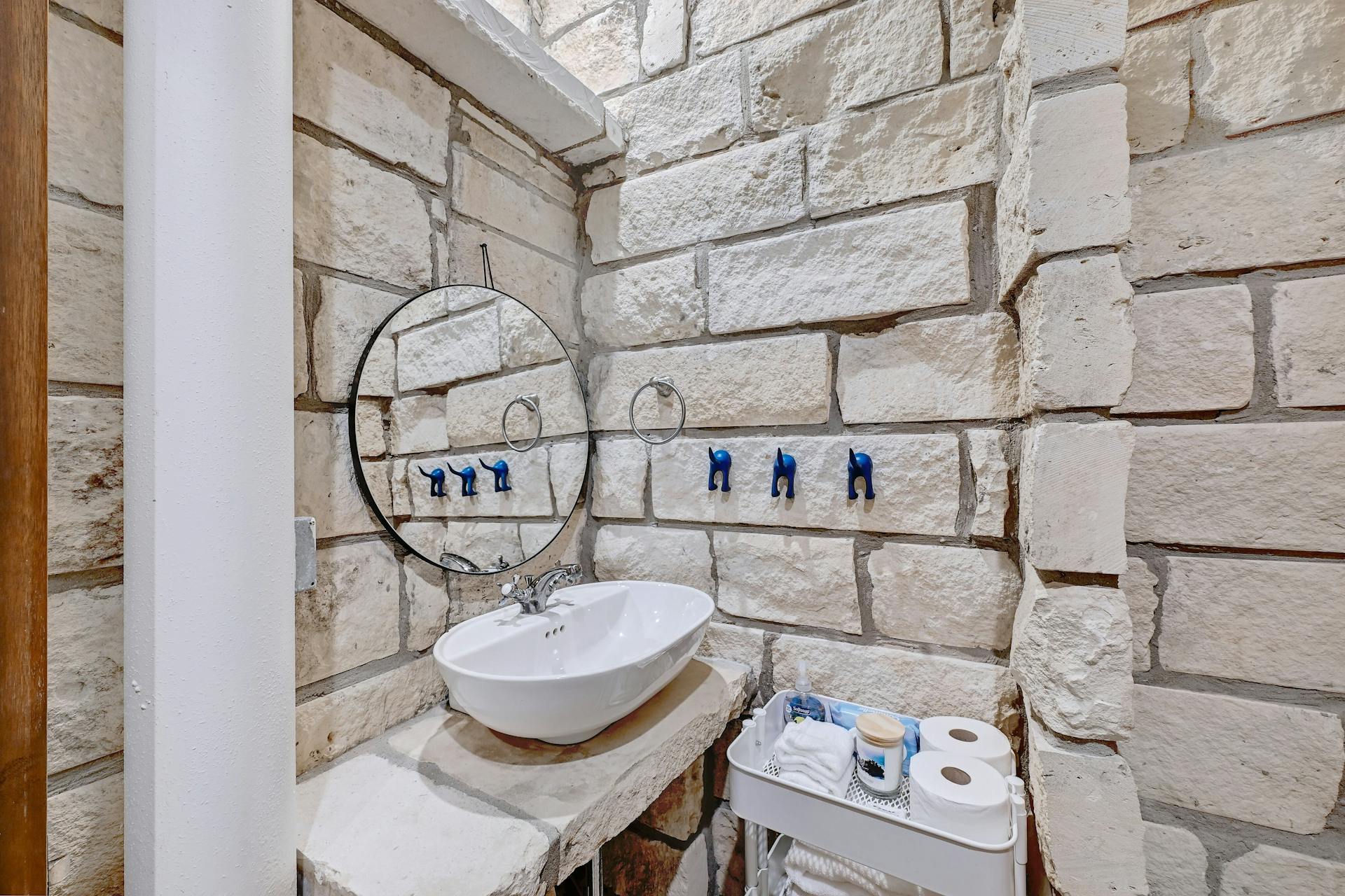 6021 Circle J Road Marble Falls, TX 78654 - Photo 12 of 39 Half bathroom featuring vanity