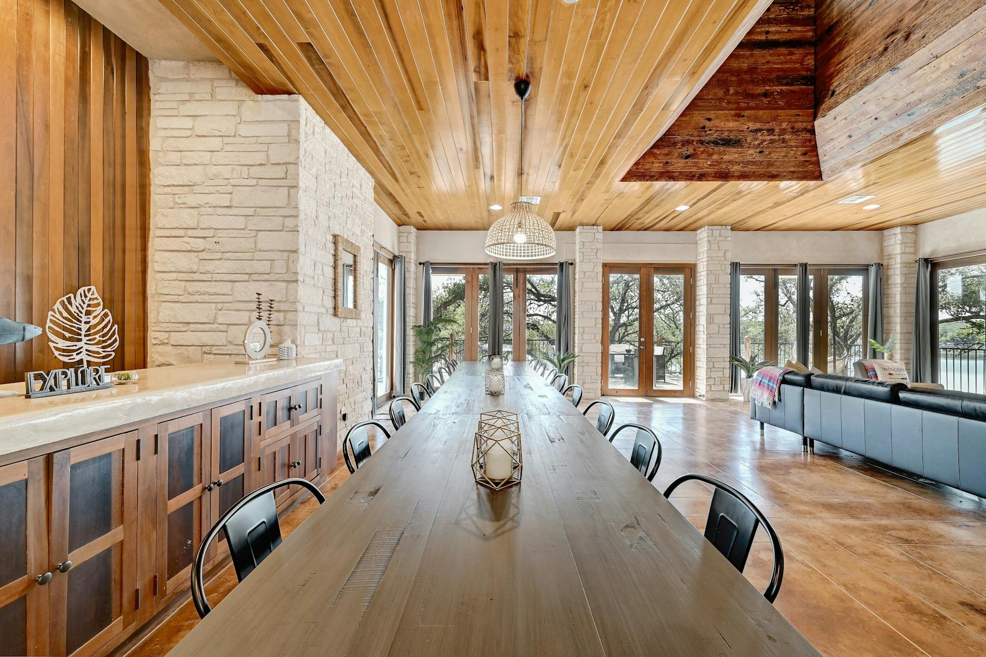 6021 Circle J Road Marble Falls, TX 78654 - Photo 26 of 39 Dining area featuring french doors and wooden ceiling