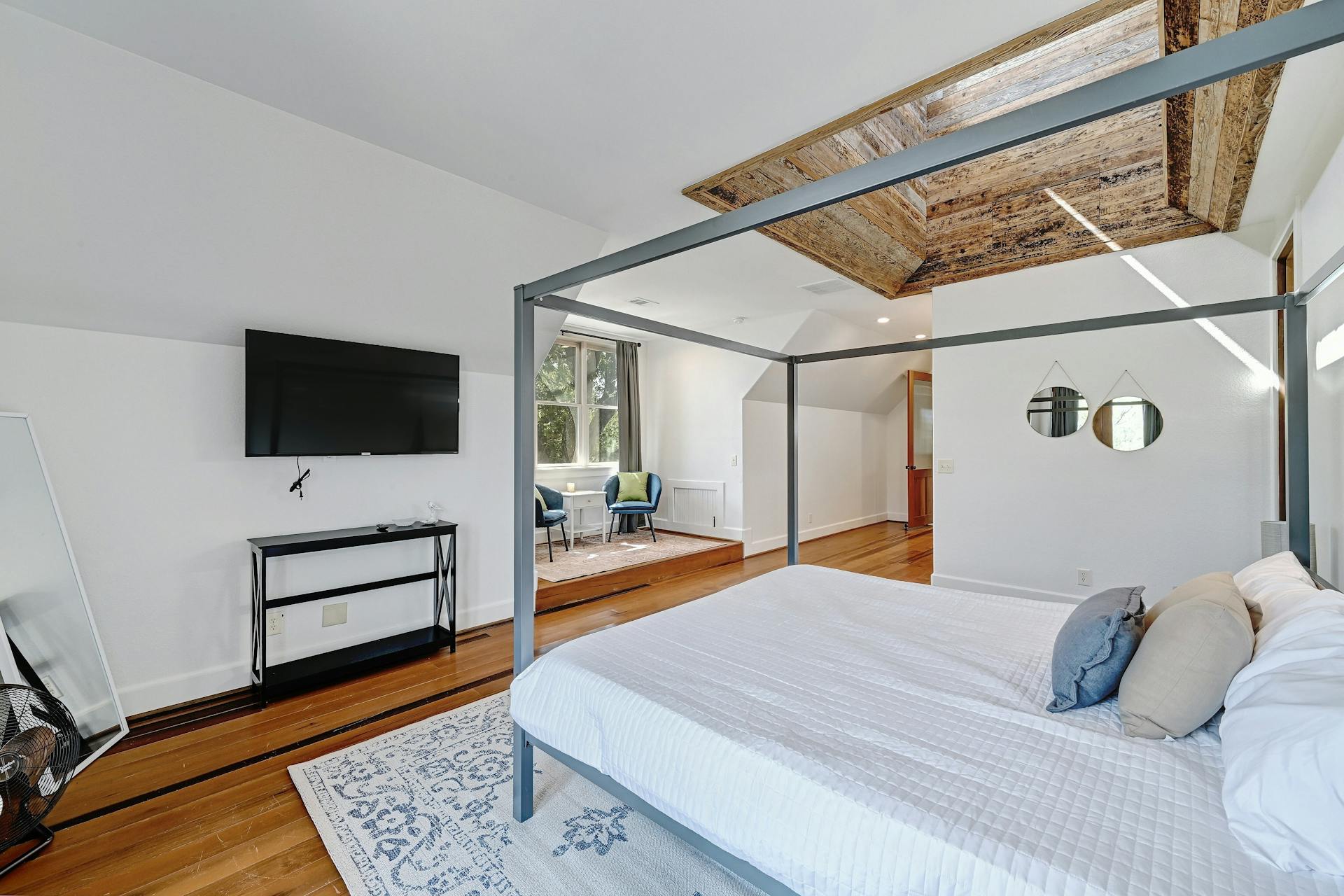 6021 Circle J Road Marble Falls, TX 78654 - Photo 36 of 39 Bedroom featuring hardwood / wood-style flooring and baseboards