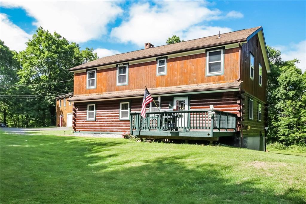 44 Stuart Road East Bridgewater, CT 06752 - Photo 1 of 1 a front view of a house with a yard